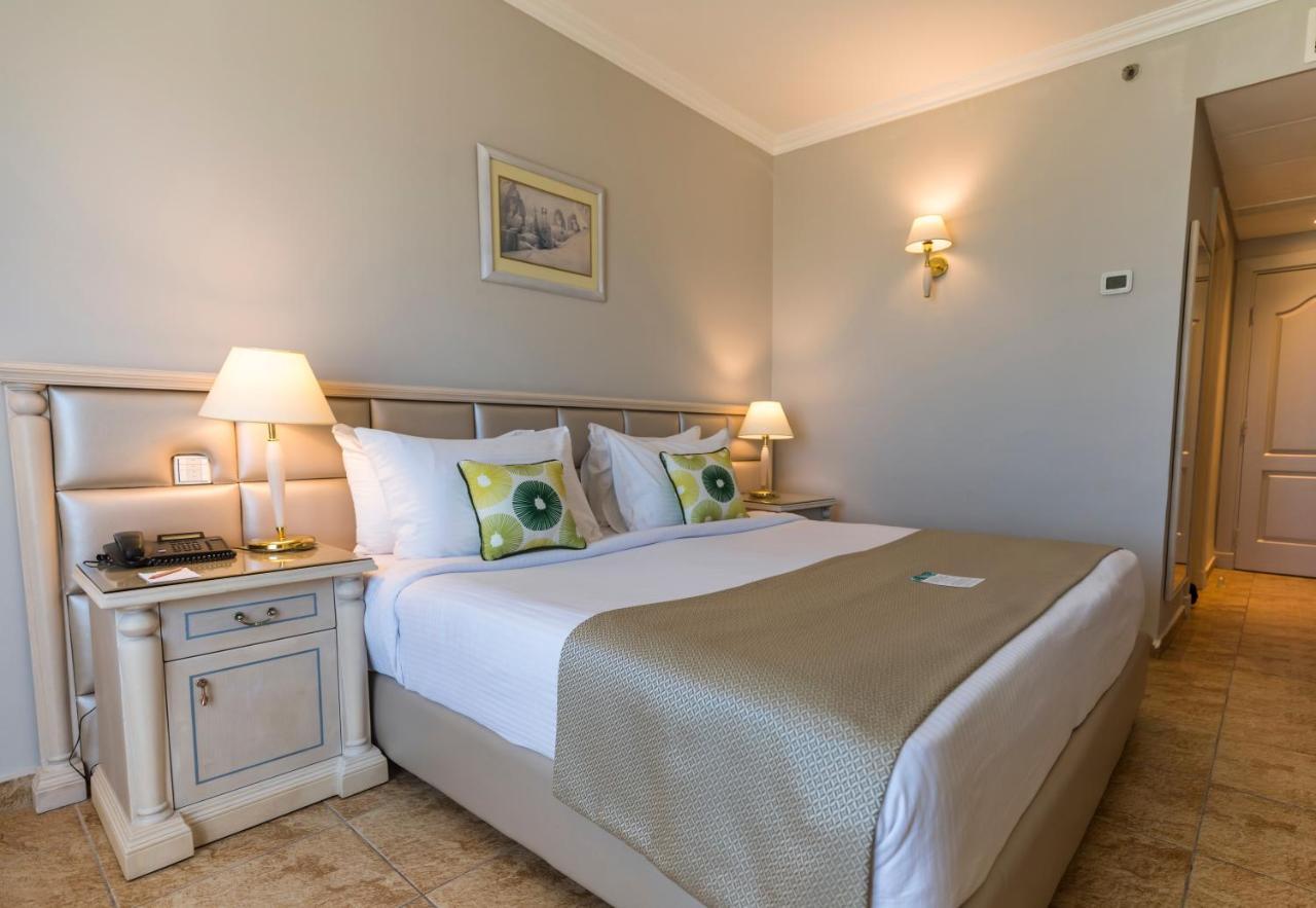 Sunrise Alex Avenue Hotel Alexandria Exterior foto A bedroom at the hotel